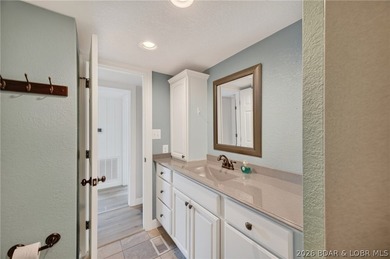 Beautifully updated lakefront home with a private dock, workshop - photo 39