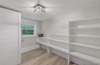 Beautifully updated lakefront home with a private dock, workshop - photo 46