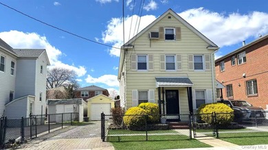 Detached updated legal 2 Family with 2.5 floors. Attic has a - photo 1