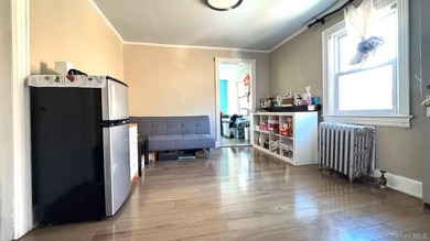 Detached updated legal 2 Family with 2.5 floors. Attic has a - photo 2