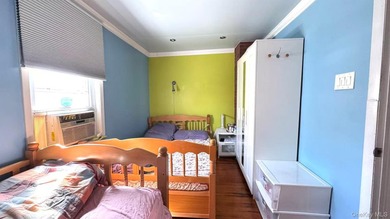Detached updated legal 2 Family with 2.5 floors. Attic has a - photo 4