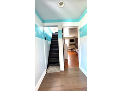 Detached updated legal 2 Family with 2.5 floors. Attic has a - photo 8