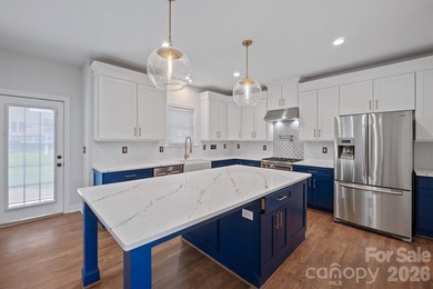 FANTASTIC home in MacAuley loaded with upgrades!!! Brand new - photo 3