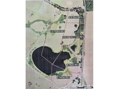 A 6.79-acre stunning lake front lot that's mostly cleared with a - photo 4