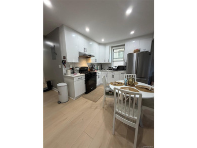 This is FULLY RENOVATED, with 2 gas meter and 3 electric meter - photo 3