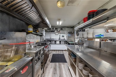 Here is your opportunity to own the legendary Big Minnow Bar and - photo 15