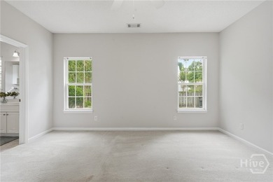 Tucked away on Wilmington Island, this two-bedroom, two-bathroom - photo 12