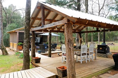 Experience true serenity on a heavily wooded 10.16 acres made - photo 2