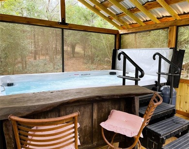 Experience true serenity on a heavily wooded 10.16 acres made - photo 4