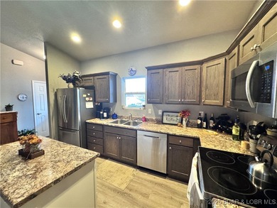 Welcome to this beautifully designed one-story home offering