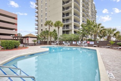Welcome to Unit 205 at Beach Colony Resort, a charming 1-bedroom - photo 28