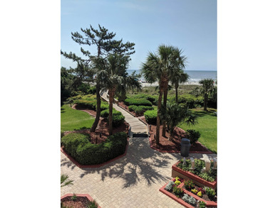 Welcome to Unit 205 at Beach Colony Resort, a charming 1-bedroom - photo 31