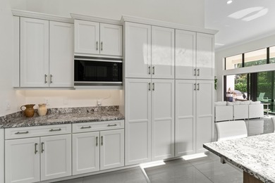 Exceptionally upgraded Callahan model in prestigious Royal Palm - photo 12