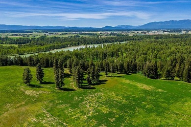 Flowing gracefully from a forested ridgeline, a gently curving - photo 24