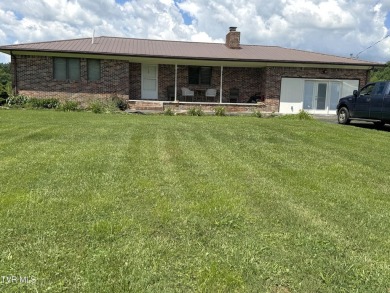 Nice, completely remodeled brick ranch with 3 master suites (one