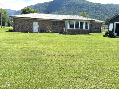 Nice, completely remodeled brick ranch with 3 master suites (one