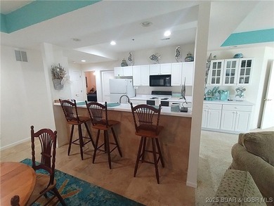 Impeccable 3-bedroom, 3-bath furnished lakefront condo with - photo 9