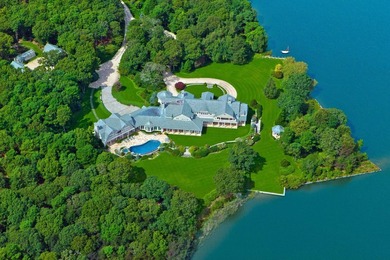 Privately tucked away on a 25-acre+/- peninsula fronting - photo 2