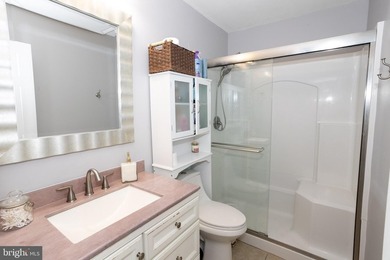 Welcome to this charming 4-bedroom, 2-bathroom rambler nestled - photo 11