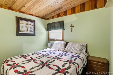 Enjoy the Lake of the Ozarks lifestyle with this charming Rocky - photo 15