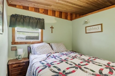 Enjoy the Lake of the Ozarks lifestyle with this charming Rocky - photo 16