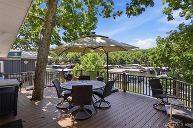 Enjoy the Lake of the Ozarks lifestyle with this charming Rocky - photo 22