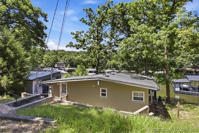 Enjoy the Lake of the Ozarks lifestyle with this charming Rocky - photo 28