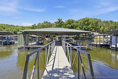 Enjoy the Lake of the Ozarks lifestyle with this charming Rocky - photo 30