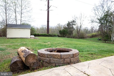 Welcome to this charming 4-bedroom, 2-bathroom rambler nestled - photo 35