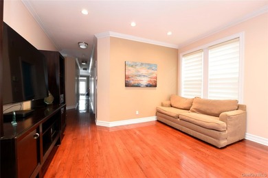 Welcome to this beautifully maintained brick two-family home in - photo 6