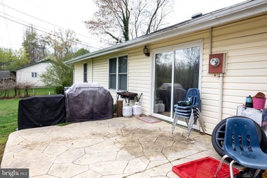 Welcome to this charming 4-bedroom, 2-bathroom rambler nestled - photo 36
