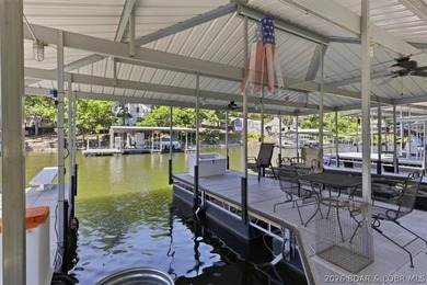Enjoy the Lake of the Ozarks lifestyle with this charming Rocky - photo 37
