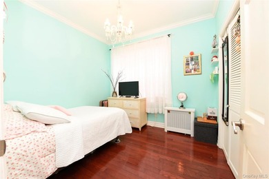 Welcome to this beautifully maintained brick two-family home in - photo 7