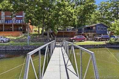 Enjoy the Lake of the Ozarks lifestyle with this charming Rocky - photo 40
