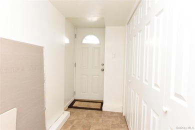 Welcome to this beautifully maintained brick two-family home in - photo 10