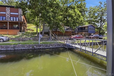 Enjoy the Lake of the Ozarks lifestyle with this charming Rocky - photo 41
