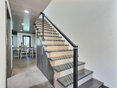 Nestled on 2.68 wooded acres with an additional 1.31-acre vacant - photo 15