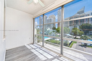 Prime opportunity in desirable Sunny Isles! This 2-bedroom, 1