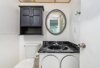 Prime opportunity in desirable Sunny Isles! This 2-bedroom, 1
