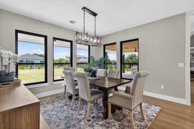 Welcome to this stunning 4-bedroom, 3-bathroom home in the gated - photo 14