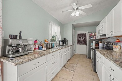 Welcome to this move-in ready 3-bedroom, 2-bath pool home - photo 14