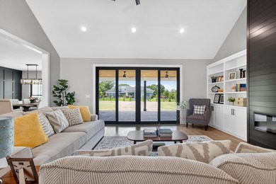 Welcome to this stunning 4-bedroom, 3-bathroom home in the gated - photo 19