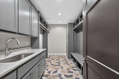 Welcome to this stunning 4-bedroom, 3-bathroom home in the gated - photo 21