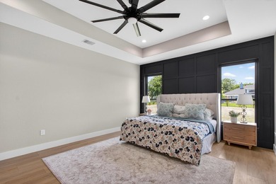 Welcome to this stunning 4-bedroom, 3-bathroom home in the gated - photo 22