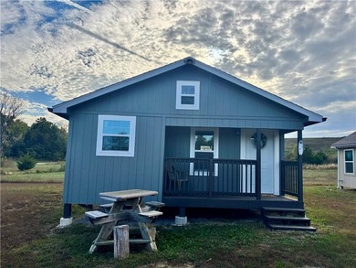 Discover your peaceful getaway at this beautiful new lake house! - photo 5