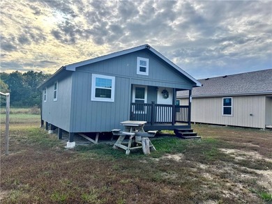 Discover your peaceful getaway at this beautiful new lake house! - photo 6