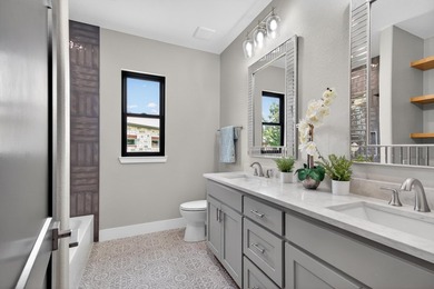 Welcome to this stunning 4-bedroom, 3-bathroom home in the gated - photo 28
