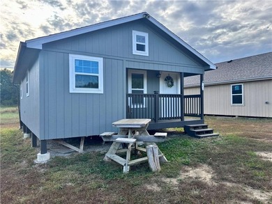 Discover your peaceful getaway at this beautiful new lake house! - photo 8