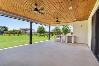 Welcome to this stunning 4-bedroom, 3-bathroom home in the gated - photo 32