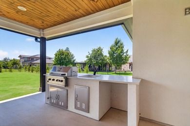 Welcome to this stunning 4-bedroom, 3-bathroom home in the gated - photo 33